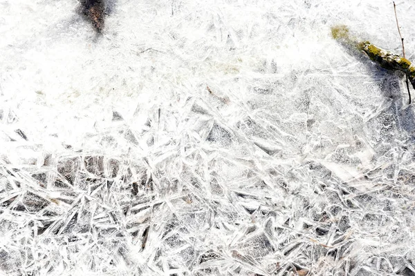 White ice and snow at ice rink as background