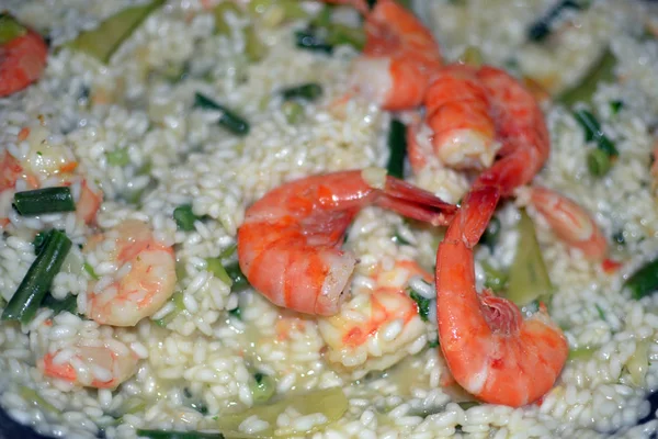shrimp risotto with pea closeup
