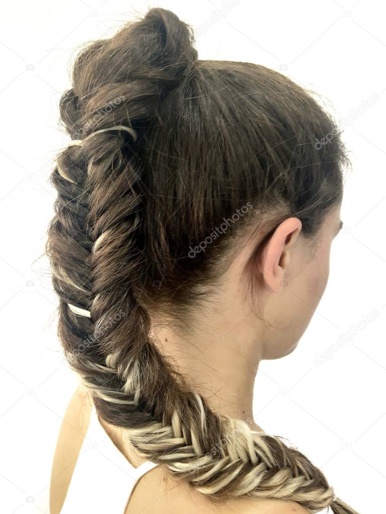 Hairstyle on long hair, braiding a fishtail