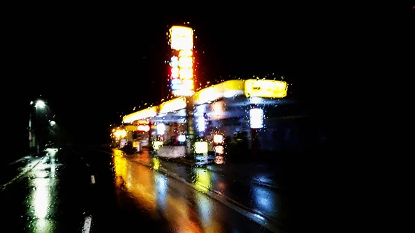 Illuminated gas station in rainy night ver.2 — Stock Photo, Image