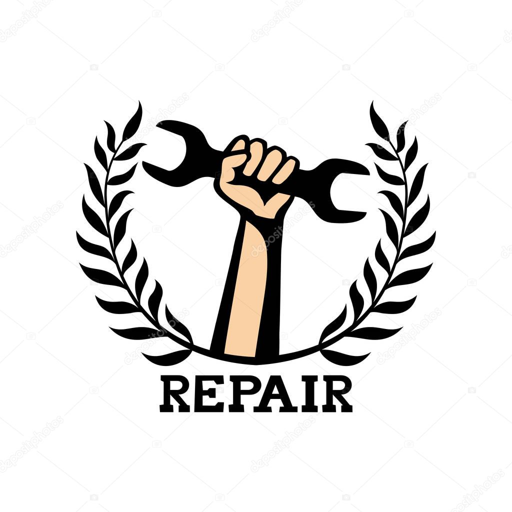 Sign of repair with a spanner in the hand on a white background.