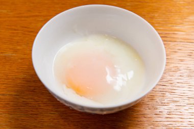 Soft boiled egg or onsen egg (onsen tamago, Hot spring egg, japanese style ) clipart