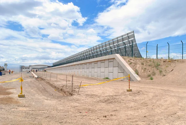 Airport deflector barrier under construction.