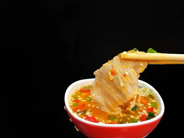 Closeup Sliced Pork Hold Chopsticks Dipping Spicy Sauce Restaurant Shabu — Stock Photo, Image