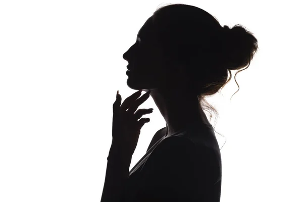 Profilo silhouette della faccia della donna su sfondo bianco isolato — Foto Stock