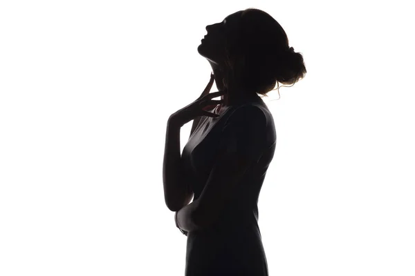 Silhouette di bella ragazza sensuale, profilo viso donna su sfondo bianco isolato, concetto di bellezza e moda — Foto Stock