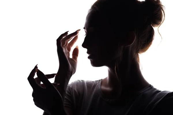 Silhueta retrato de mulher, menina rosto no fundo isolado branco — Fotografia de Stock