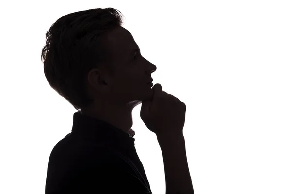 Silhouette Porträt eines nachdenklichen Kerls, Mann Gesicht Profil auf einem weißen isolierten Hintergrund — Stockfoto