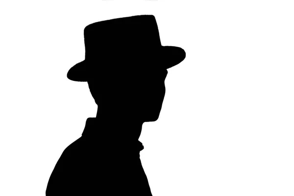 Silhouet van stijlvolle jonge man in Business Hat, Profiel van anonieme persoon op witte geïsoleerde achtergrond — Stockfoto