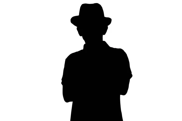 Silhueta de jovem elegante em chapéu de negócios, pessoa irreconhecível no fundo isolado branco — Fotografia de Stock