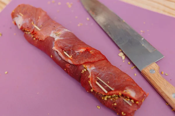 Preparation of raw meat roll