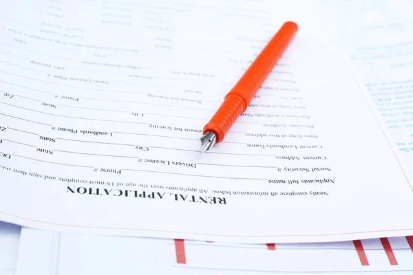 Young Man Writing Profit Paper Pen — Stock Photo, Image