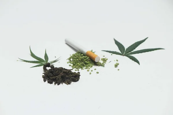 Close Marijuana Leaf Seeds Dried Buds Cigarette White Background — Stock Photo, Image