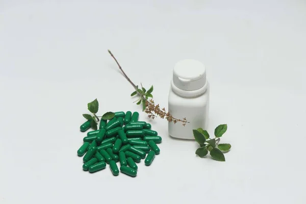 Ayurvedic Green Vitamin Capsule White Bottle Basil Leaves Isolated White — Stock Photo, Image