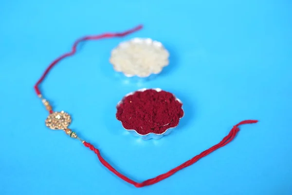 Індійський Фестиваль Raksha Bandhan Тло Елегантним Rakhi Rice Grains Kumkum — стокове фото