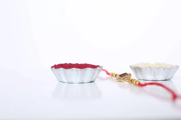 Festival Indio Raksha Bandhan Fondo Con Elegante Rakhi Granos Arroz — Foto de Stock