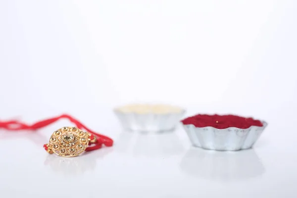 Festival Indio Raksha Bandhan Fondo Con Elegante Rakhi Granos Arroz — Foto de Stock