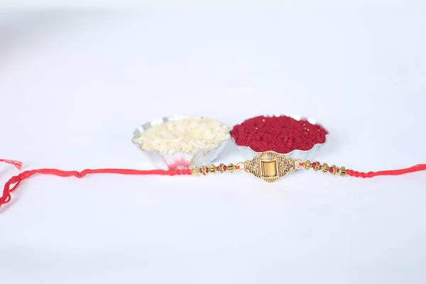 Festival Indiano Raksha Bandhan Fundo Com Elegante Rakhi Grãos Arroz — Fotografia de Stock