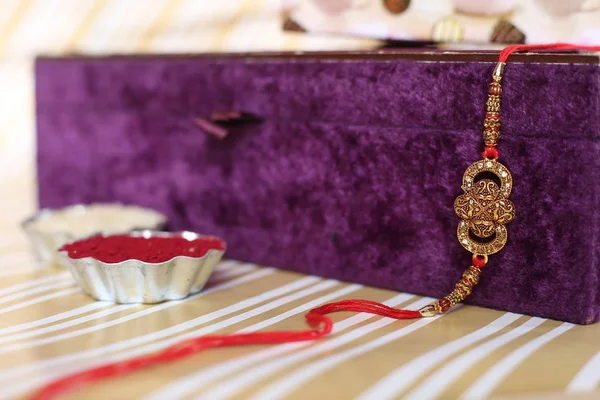 Індійський Фестиваль Raksha Bandhan Тло Елегантним Rakhi Rice Grains Kumkum — стокове фото