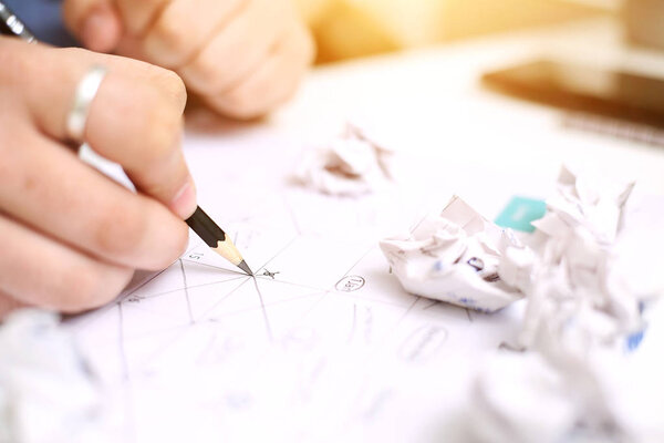 Picture of Man holding Calendar and marking on date. Isolated on white background.