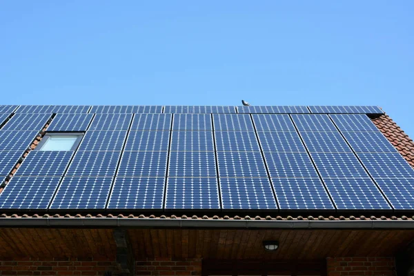 Solar energy panels on roof of house — Stock Photo, Image