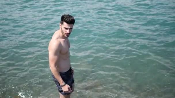 Handsome Muscular Young Man Standing Sea Coast Beach — Stock Video