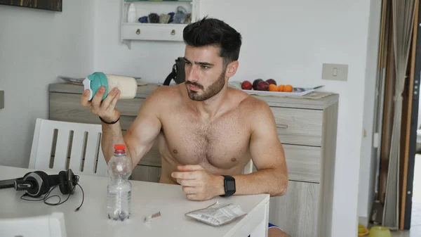 Man drinking protein shaker from blender — Stock Photo, Image