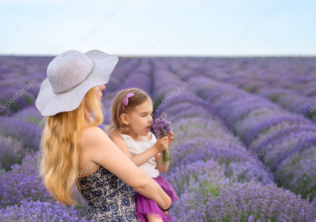 Woman and girl enjoying a lavender field view