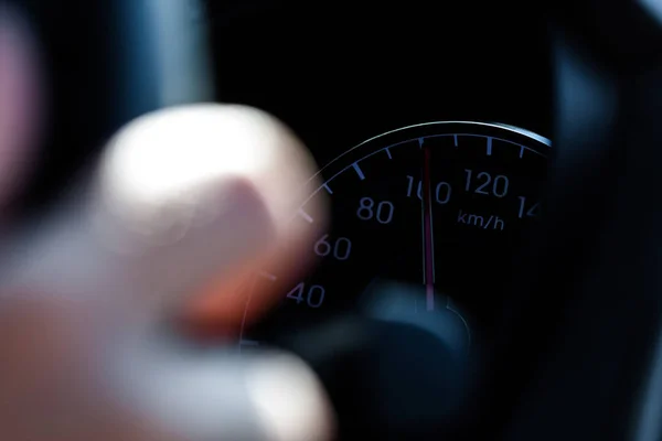 Hands of person driving a vehicle. Technology and traffic.