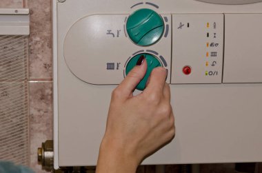 Bir ev gaz Isıtma birim regülatör düğme ısı arzında artış