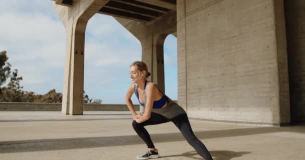 Young Strong Woman Doing Yoga Exercise Stone Bridge — Stock Video