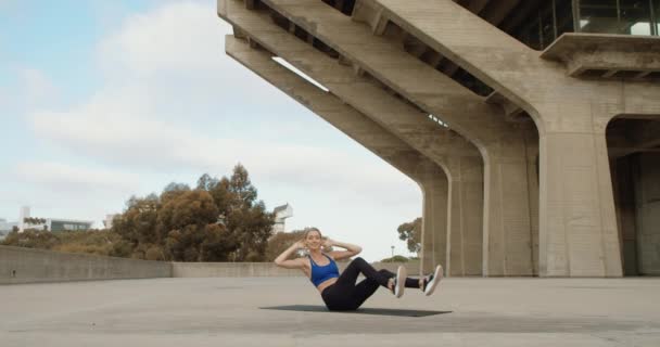 Young Strong Woman Doing Yoga Exercise Stone Bridge — Stock Video