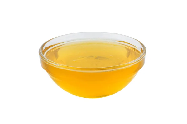 Miel en cuenco aislado sobre fondo blanco — Foto de Stock
