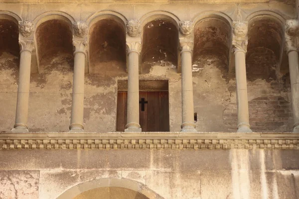 porticoed to decorated columns of a Catholic monastery in Italy
