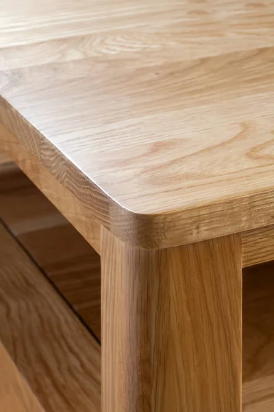 Edge and corner of oak wood table top