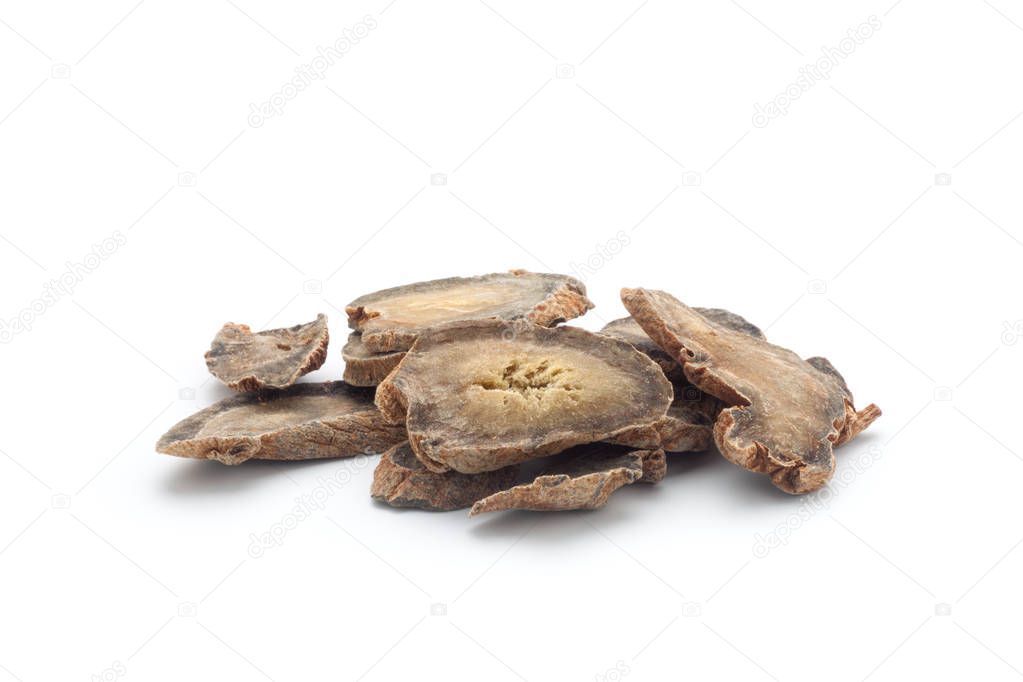 Sliced of pseudo-ginseng on white background. Chinese herbal medicine.