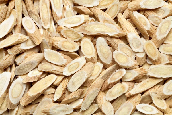 Dilimlenmiş Astragalus veya Huang Qi, Çin bitkisel ilaç.