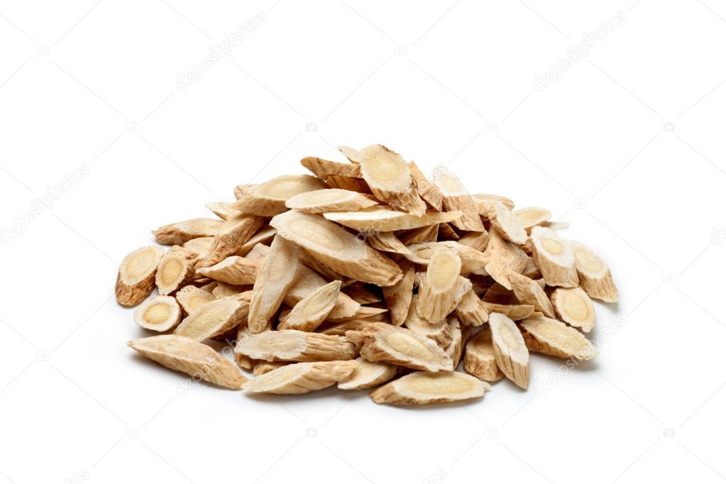 Pile of Astragalus  (Huang Qi) isolated on white background. Chinese herbal medicine.