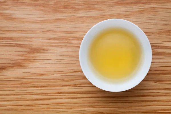Eine Tasse Grünen Tee Auf Einem Holztisch Ansicht Von Oben — Stockfoto