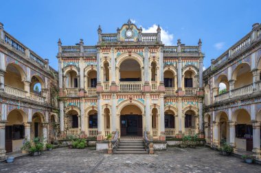 Bac Ha, Vietnam - Aug 11, 2019 : Hoang A Tuong Royal palace is travel destination located in the centre of Bac Ha, Lao Cai, Vietnam ancient architecture constructed in 1921 clipart