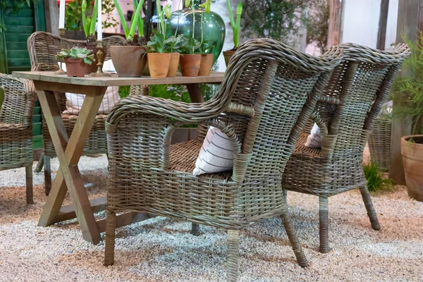 Rattan chair, Wicker chair in the garden retro vintage style interior decoration