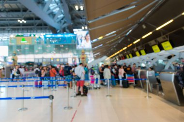 Passengers arrive check-in counters at Suvarnabhumi Airport Thailand  is one of the busiest in Asia blured for background clipart