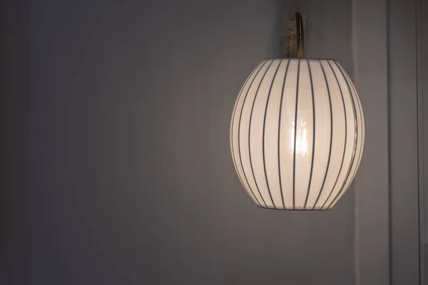 Modern fabric wall lamp on gray wall interior lighting bulbs decoration contemporary