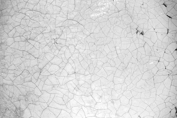 Soyulmuş boya çatlakları ve kırıntıları olan eski bir arka plan. Açık beyaz turuncu doku