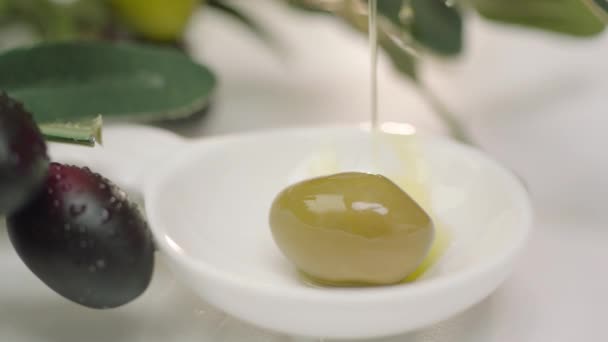 Pouring Green Olive Oil — Stock Video