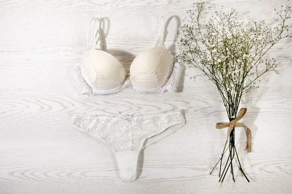 Sexy White Trendy Feminine Lingerie Flowers Wooden Background — Stock Photo, Image