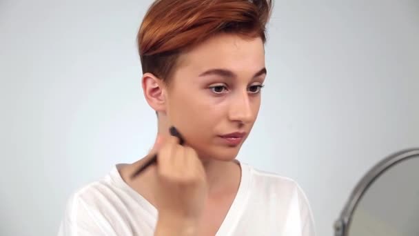 Beautiful Young Woman Stylish Haircut Applying Skin Foundation Brush Front — 비디오