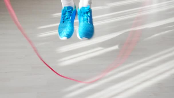 Close Feet Athletic Man Blue Trainers Approaching Skipping Rope Taking — Stock Video