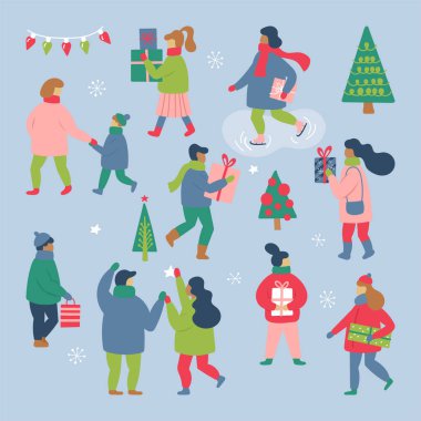 Noel tatili için alışveriş kış giysileri giymiş insanlar.