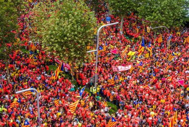 BARCELONA, SPAIN - SEPTEMBER 11, 2018: Hundreds of thousands of Catalans call for independence from Spain on the National Day of Catalonia. clipart